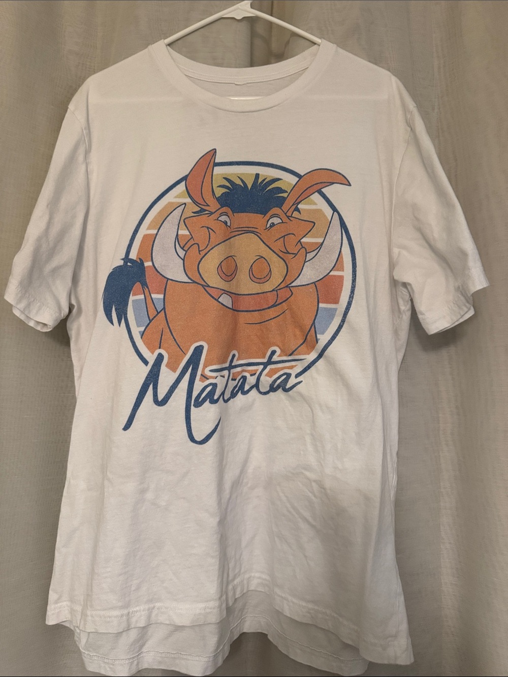 White 'Matata' Pumbaa Graphic Tee. Disney